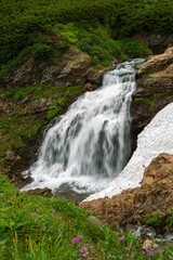 Fototapeta na wymiar Waterfall in Vatchkazhets valley (former volcano field), Kamchatka, Russia