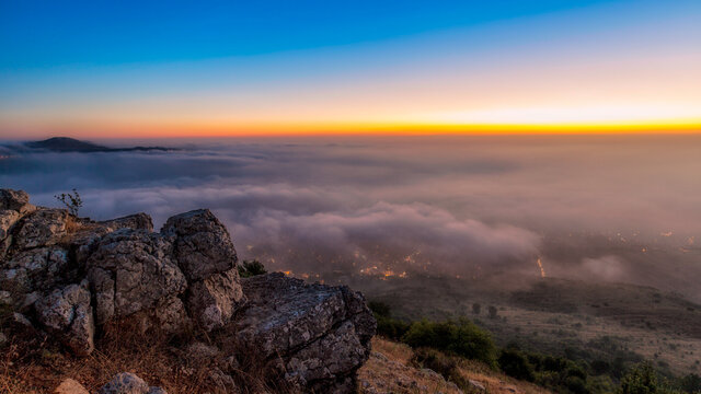 Aerial photo of sea of clouds during sunset
