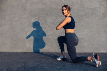sportswoman enjoying workout squatting, lower body and leg muscles workout, fitness woman doing...