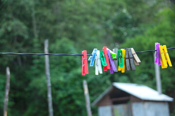 Fototapeta na wymiar colorful clothespin.on the rope