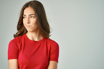 Obraz premium beautiful woman in a red t-shirt hair care Studio Lifestyle
