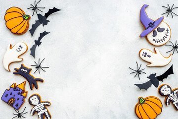 Fototapeta premium Funny cookies and spiders for Halloween party background