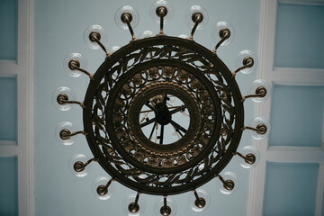 large vintage chandelier with many bulbs 