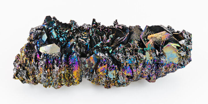 Synthetic silicon carbide with iridescent crystals of rough surface on white background. Carborundum chemical compound. In nature rare as moissanite mineral. Use as abrasive or semiconductor material.