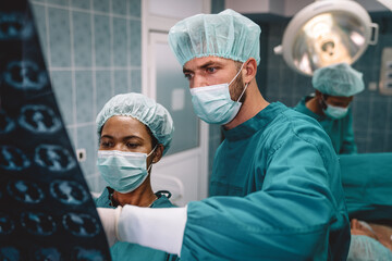 Doctors preparation for surgical operation in hospital. Healthcare medicine concept