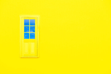 Closed yellow door on yellow wall. Abstract metaphor, modern minimal concept.Horizontal creative poster, greeting cards, headers, website  and app. Surreal dream scene.
