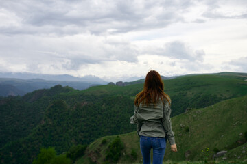 Naklejka premium woman hiker mountains travel landscape adventure nature