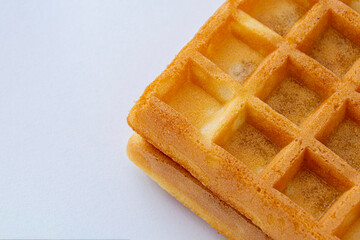 soft waffle close-up on white. image for project and design, copy space.