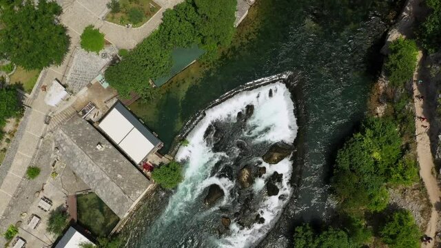 Aerial Time Lapse Panning Beautiful Shot Of Buna River At Vrelo Bune During Sunny Day - Blagaj, Bosnia and Herzegovina