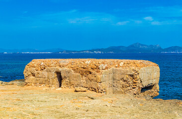 Fototapeta na wymiar Sculptures coast and beach landscape panorama Can Picafort Mallorca Spain.