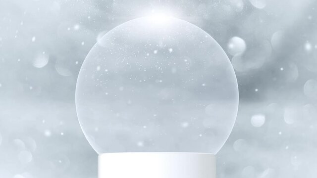 Christmas holiday empty snow globe snowball with falling snowflakes snowfall and bokeh glittering background. Copy space seamless loop background greeting card.