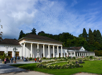Naklejka na ściany i meble Casino and Health spa center in the spa park of Baden Baen with blue sky. Germany, Europe