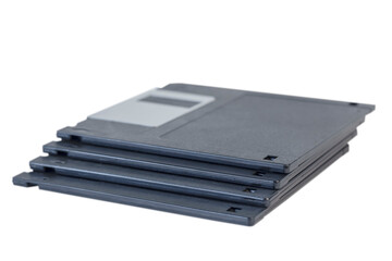 four floppy disks stacked on top of each other isolated on white