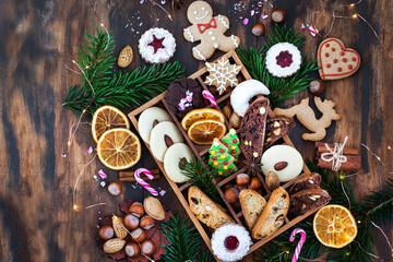 Sweet Christmas cookies in wooden box on rustic table