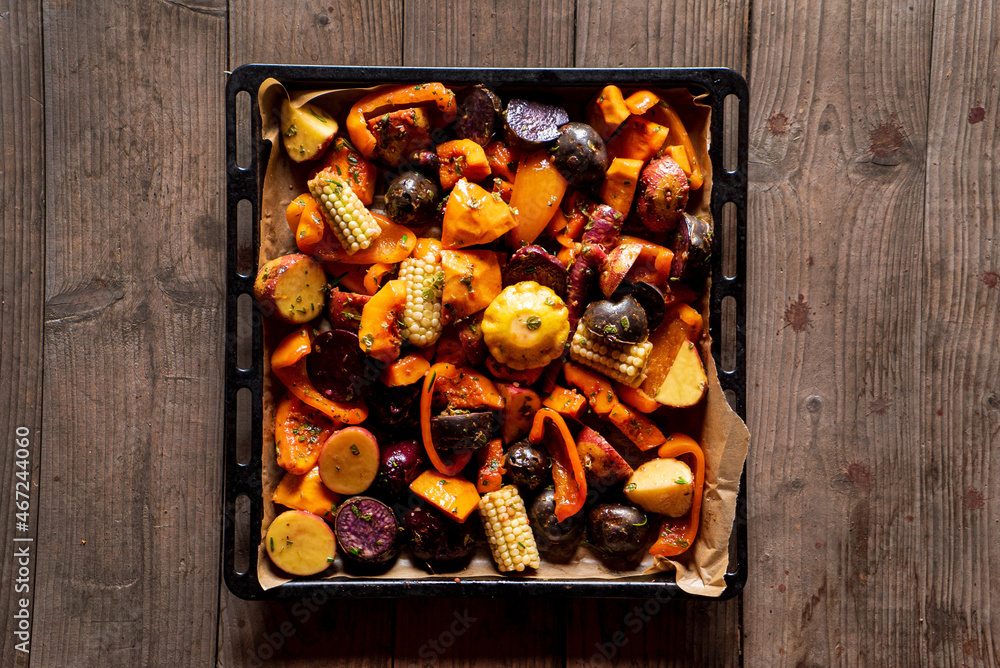 Wall mural roasted vegetables with herbs and spices