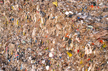 Garbage dump with plastic bags and food waste. Recycling of waste on junk yard. Dispose the rubbish in landfill. Trash disposal and rubbish dump with polution. Ecology, refuse and natural resources