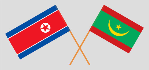 Crossed flags of North Korea and Mauritania. Official colors. Correct proportion