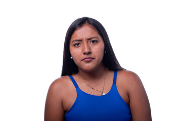 Angry dark skinned woman isolated on white background. Latin woman with angry expression, purple...