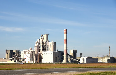 Cement plant with pipes. Сement production process and Industrial solution. Factory with smoke...