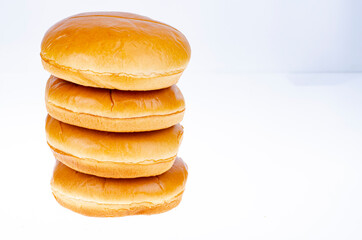 Round hamburger buns isolated on white background. Studio Photo.