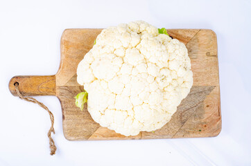Head of fresh cauliflower on white background. Studio Photo.