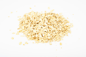 Pile of oatmeal isolated on white background. Healthy eating. Studio Photo.
