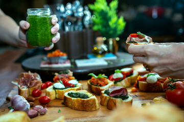 A gourmet plate of cold cuts and cheese on a table.