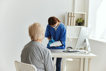 elderly woman and doctor Hospital visit medical masks