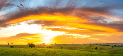 Spectacular sunset, panoramic Beautiful sunset with yellow clouds