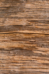 Fototapeta premium Wooden background - view of the sawn wood. Vertical background with space for text