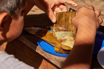 Documentary photography preparation of Oaxacan mole in Mexico, in a traditional way. Oaxacan tamales. Mexican food. Latin food. Spicy food.