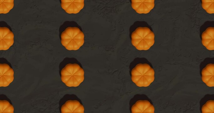 3d render with orange pumpkins on the background of the ground from above