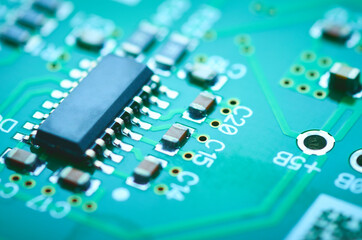Electronic chip on the board close-up,high-tech close-up, soft focus