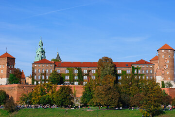 panorama of Wawel Royal Castle facade in Krakow Poland on warm sunny autumn day with clear blue sky