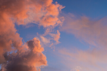 Beautiful pastel cloudy sunset sky. Pink and blue magic dreamlike evening sky