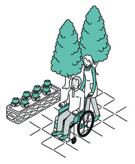 車椅子のシニア男性と女性介護士