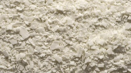 Soy wax for making candles. Circular motion. Candle making hobby.