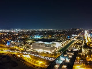 Foto op Plexiglas anti-reflex Aerial cityscape view of southern Athens at night. © panosk18