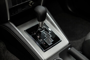 close-up of the accelerator handle and buttons. automatic transmission gear of car , car interior.
