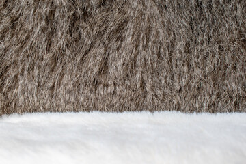Brown fur background texture with white fur base for display stand.