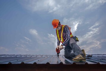 Construction expertise worker wear safety uniform install new roof,Roofing tools,Electric drill...