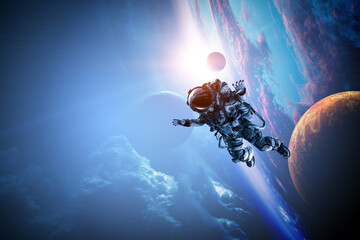 Astronaut at spacewalk . Mixed media - obrazy, fototapety, plakaty