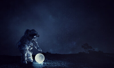 Astronaut and moon . Mixed media