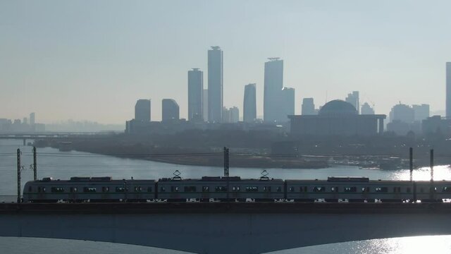 Subway crossing Dangsan iron bridge at morning, Aerial view. Seoul, Korea. 서울, 당산철교, 지하철, 한강