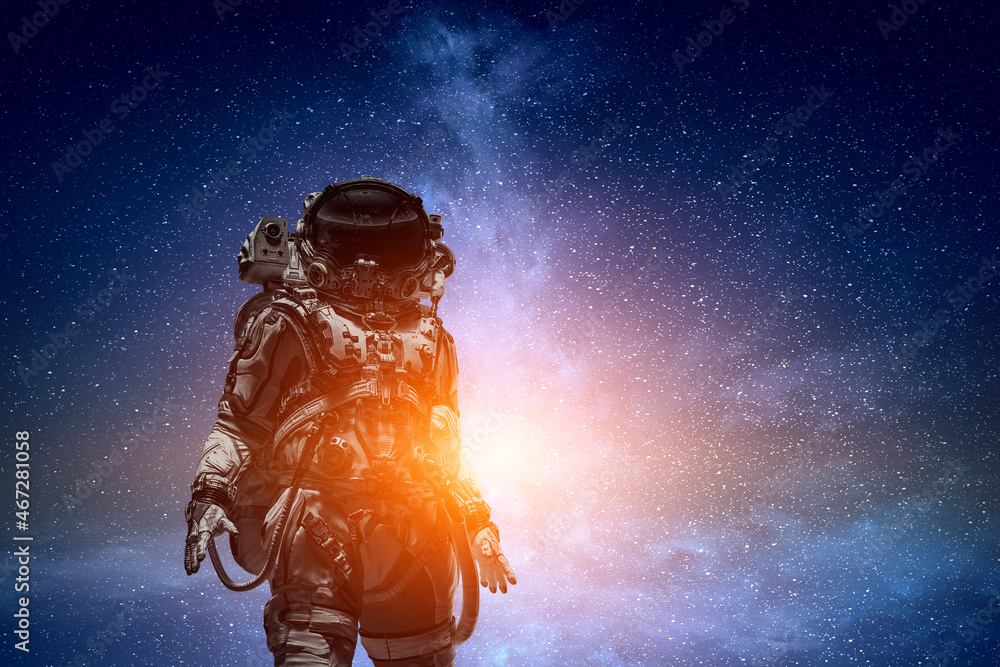 Wall mural astronaut walking on an unexplored planet