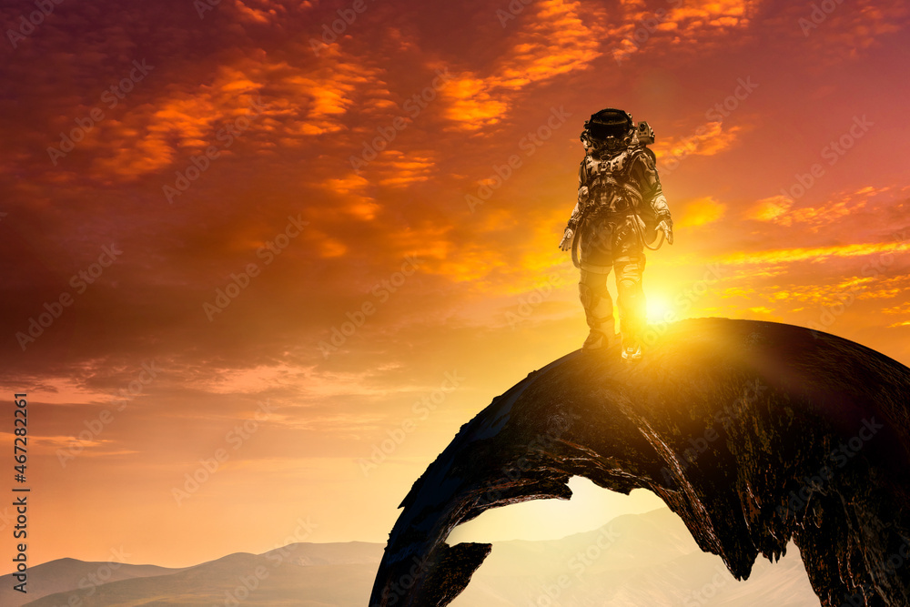 Wall mural astronaut walking on an unexplored planet