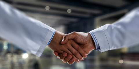 Partnership concept. Image of handshake