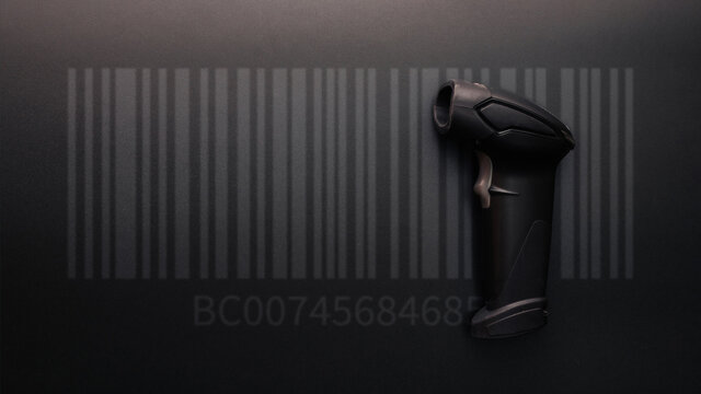 Barcode concept. Retail label barcode scan. Reader laser scanner for warehouse on black background. Warehouse inventory management.