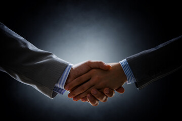 Partnership concept. Image of handshake