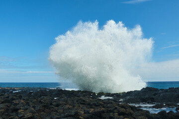 waves crashing on rocks